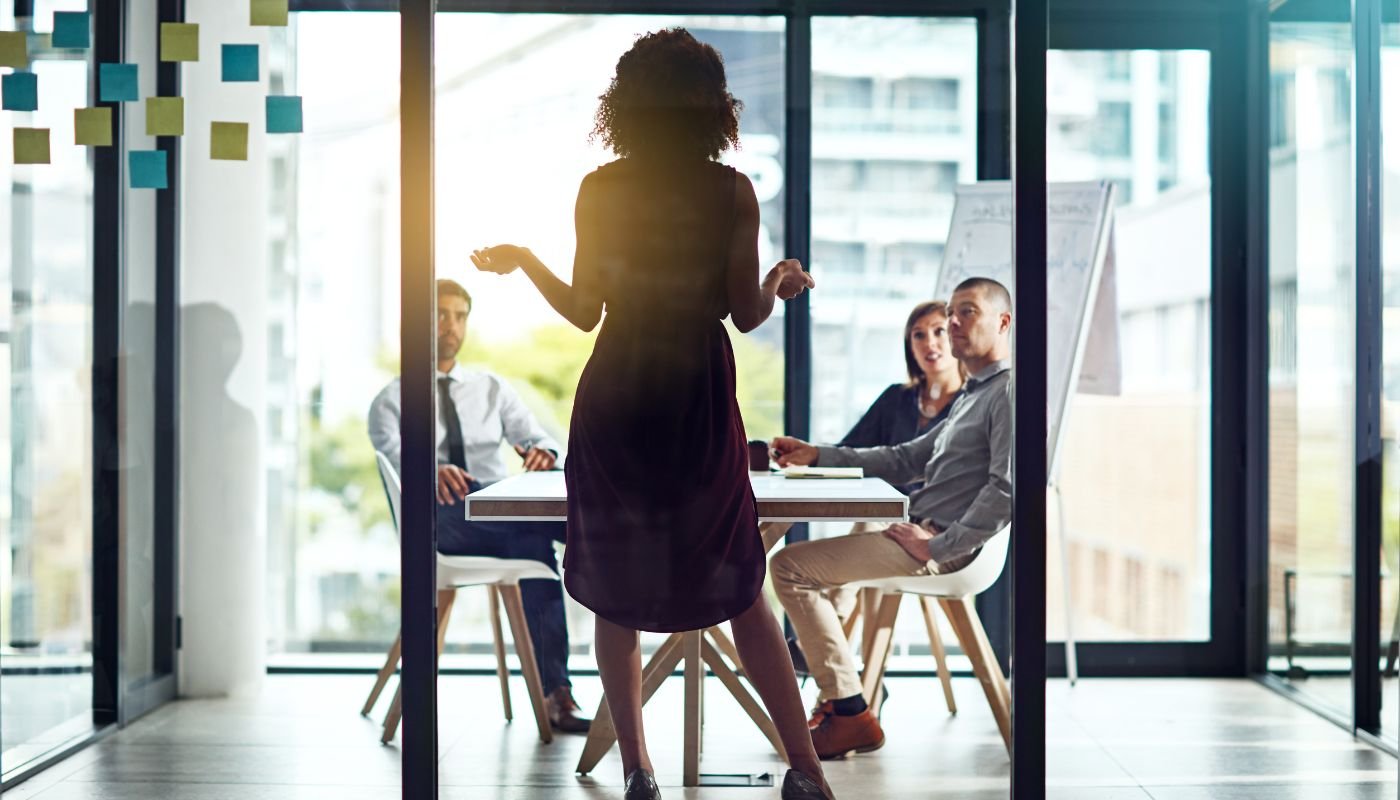 Woman making a presentation in a boardroom